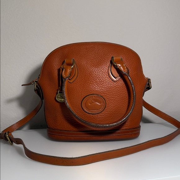 Dooney & Bourke Handbags - 🦆Dooney & Bourke Vintage All Weather Tan Small Norfolk Case Leather Shoulder Bag
